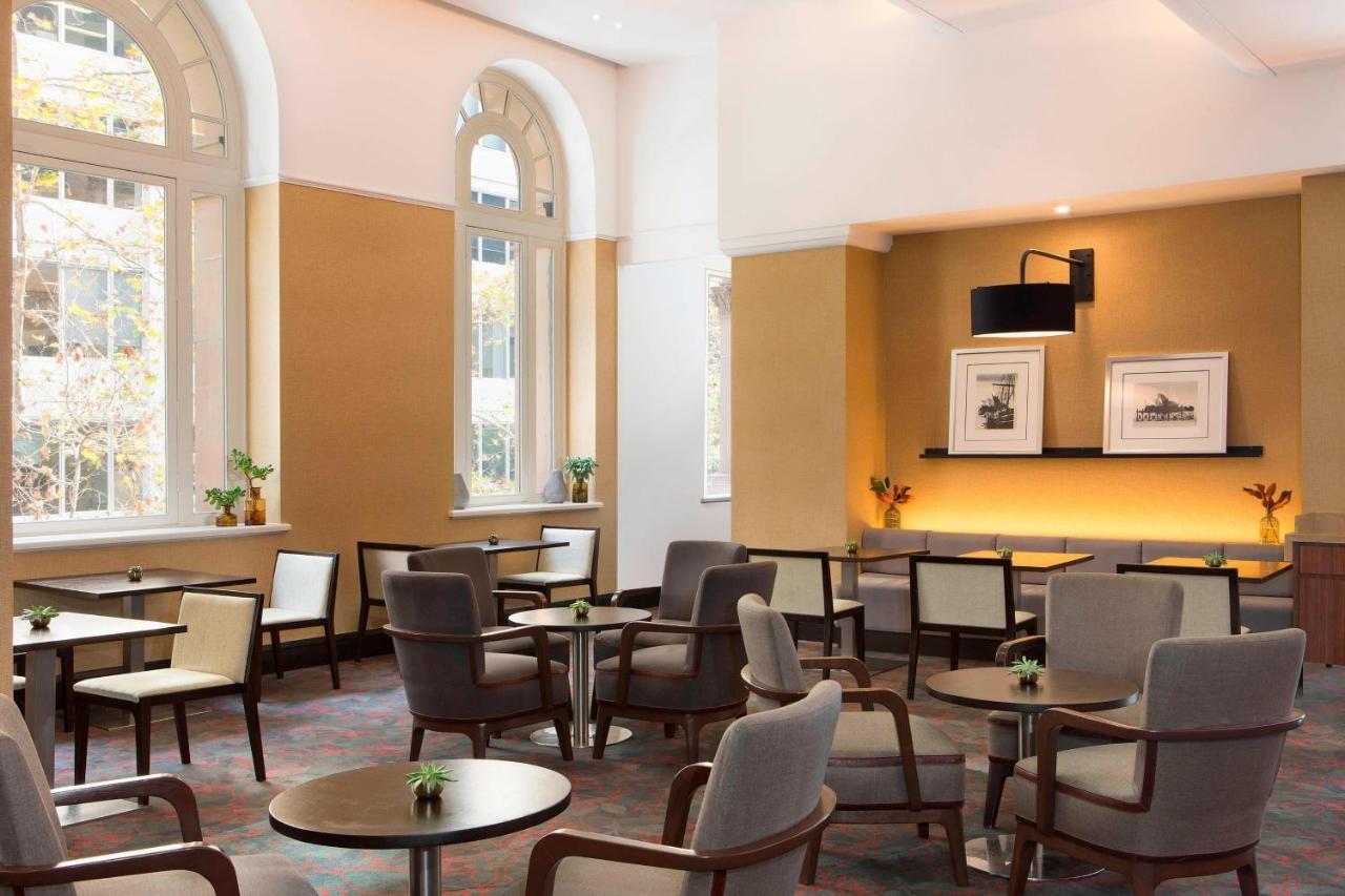 Sydney Harbour Marriott Hotel At Circular Quay Exterior photo The Library at The Fullerton Hotel